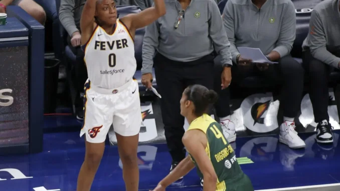 8-Fevers-Kelsey-Mitchell-from-deep-over-Skylar-Diggins-Smith-South-Bend-scaled
